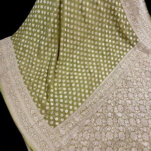 Pure Khaddi Georgette Banarasi Silk Saree in Mehandi Green Green Color with Muted Gold Weave  | SILK MARK CERTIFIED