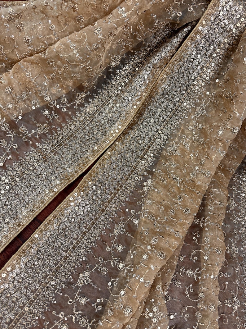 May include: A set of three ceramic mugs with a speckled, matte finish. The mugs are in shades of cream, light gray, and dark gray. Each mug has a simple, minimalist design, perfect for coffee or tea.