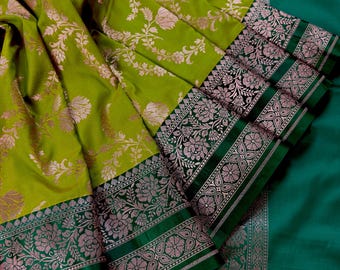 Statement Mehendi Green and Bottle Green Color Semi Pure Banarasi Mashru Silk Sareewith Copper Zari Weave