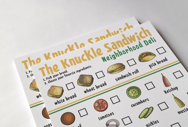 Pu&ograve; includere: Un menu bianco e verde con il testo "The Knuckle Sandwich Neighborhood Deli" e un elenco di controllo degli ingredienti per panini, tra cui pane bianco, pane integrale, panini, pane pita, pomodori, cetrioli, sottaceti, ketchup e senape.