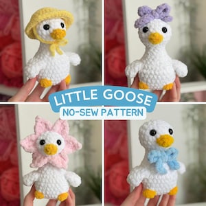 May include: Four crocheted white geese with yellow beaks and feet. Each goose has a different accessory: a yellow hat, a purple bow, a pink flower, and a blue bow. The text "LITTLE GOOSE NO-SEW PATTERN" is displayed.