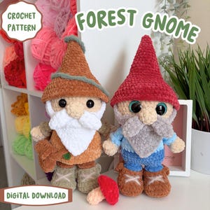 May include: Two plush forest gnomes with large eyes, beards, and pointed hats. One gnome wears a brown outfit, the other a blue outfit. The image includes the text "FOREST GNOME", "CROCHET PATTERN", and "DIGITAL DOWNLOAD". A red mushroom is in the foreground.