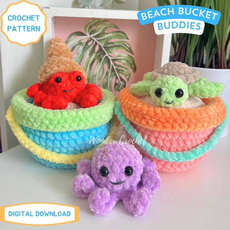 May include: Crochet pattern for "Beach Bucket Buddies" featuring a red crab, a green turtle, and a purple octopus. Each character sits in a colorful bucket. The buckets are in shades of blue, green, yellow, orange, and pink. The text "Crochet Pattern" and "Digital Download" are visible.