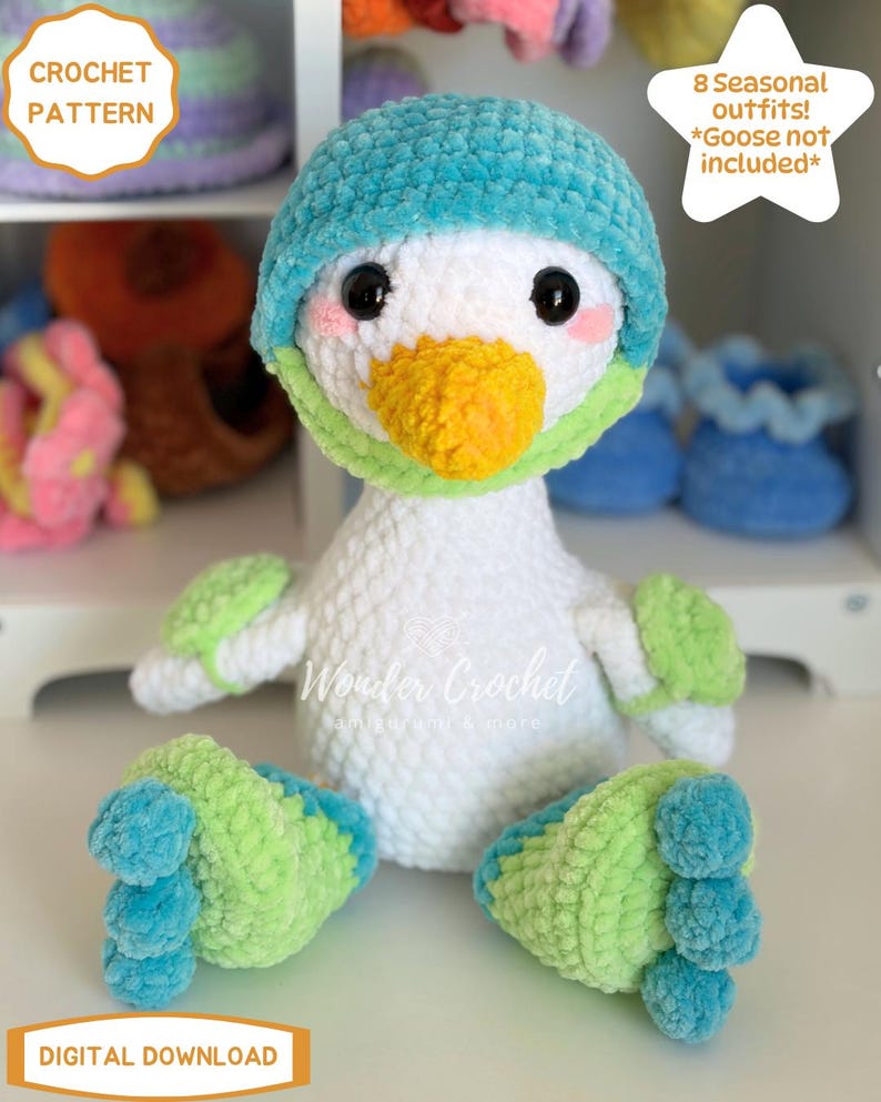 May include: A plush crochet goose toy with white body, teal hat, orange beak, and light green accents on the feet and wings. The image includes text stating CROCHET PATTERN, 8 Seasonal outfits! *Goose not included*, Wonder Crochet, and DIGITAL DOWNLOAD.
