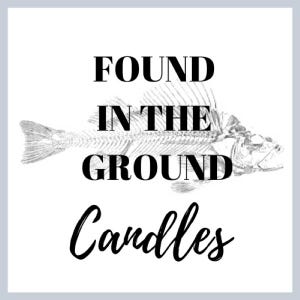 May include: Black and white image of a fish skeleton with the text "FOUND IN THE GROUND Candles" below it.