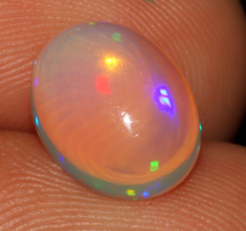 Marvelous Rainbow Fire Opal Cabochon Gemstone 1.80 Carat Oval Shape White Opal Cabochon Jewelry Gemstone 10x8x5 MM Sku= B125