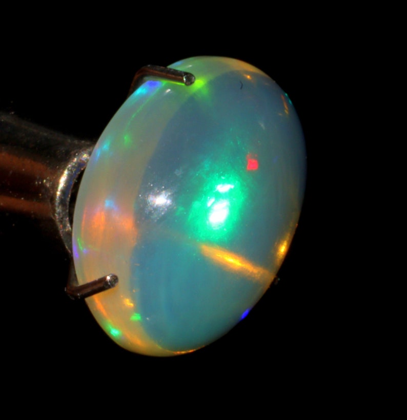 Marvelous Rainbow Fire Opal Cabochon Gemstone 1.80 Carat Oval Shape White Opal Cabochon Jewelry Gemstone 10x8x5 MM Sku= B125