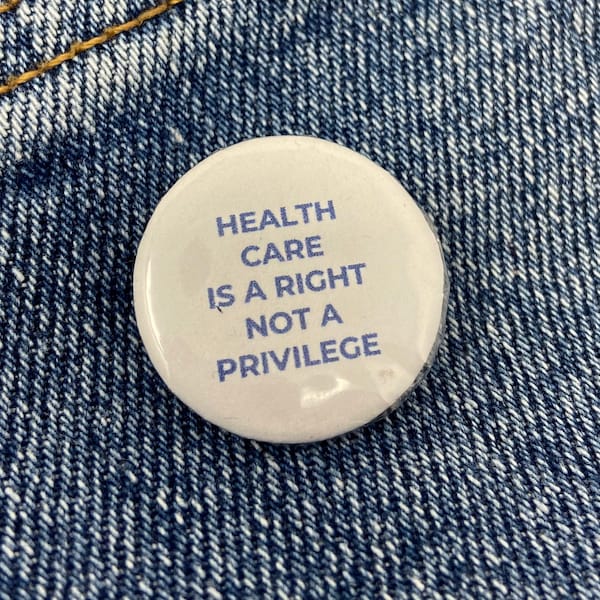 1" 'Health Care is a Right, Not a Privilege' button badge