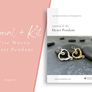 May include: A tutorial and kit for making a wire woven heart pendant. The image shows two heart pendants, one silver and one gold, on black stones. The text "tutorial & kit Heart Pendant" is visible in the image.