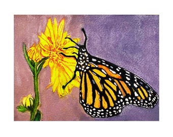 May include: A watercolor painting of a monarch butterfly with orange, black, and white wings perched on a bright yellow flower with a green stem. The background is a textured wash of purple and muted pink tones, creating a soft artistic effect.