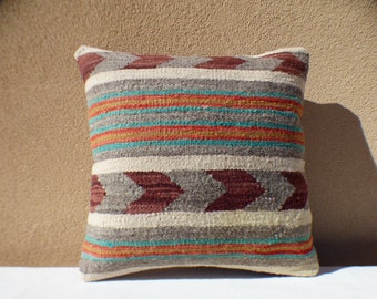 Distinctive pillows finely hand-crafted in New Mexico from thoughtfully curated vintage Navajo rugs and traditional Spanish weavings.