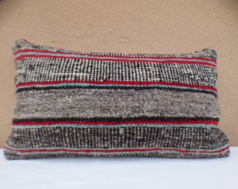 Distinctive pillows finely hand-crafted in New Mexico from thoughtfully curated vintage Navajo rugs and traditional Spanish weavings