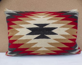 Distinctive pillows finely hand-crafted in New Mexico from thoughtfully curated vintage Navajo rugs and traditional Spanish weavings.