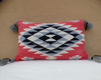 Distinctive pillows finely hand-crafted in New Mexico from thoughtfully curated vintage Navajo rugs and traditional Spanish weavings.