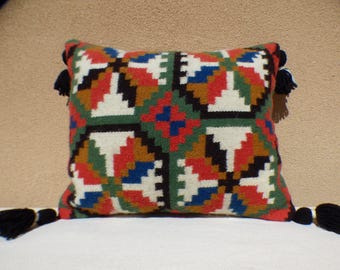 Distinctive pillows finely hand-crafted in New Mexico from thoughtfully curated vintage Navajo rugs and traditional Spanish weavings.
