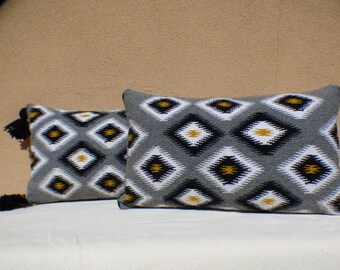 Distinctive pillows finely hand-crafted in New Mexico from thoughtfully curated vintage Navajo rugs and traditional Spanish weavings.