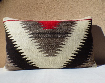 Distinctive pillows finely hand-crafted in New Mexico from thoughtfully curated vintage Navajo rugs and traditional Spanish weavings.