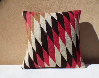 Distinctive pillows finely hand-crafted in New Mexico from thoughtfully curated vintage Navajo rugs and traditional Spanish weavings.