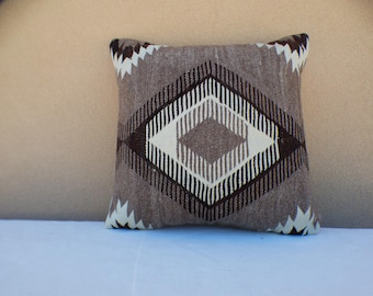 Distinctive pillows finely hand-crafted in New Mexico from thoughtfully curated vintage Navajo rugs and traditional Spanish weavings.