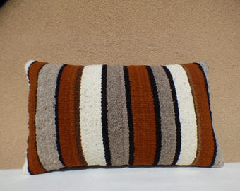 Distinctive pillows finely hand-crafted in New Mexico from thoughtfully curated vintage Navajo rugs and traditional Spanish weavings.