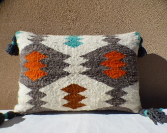 Distinctive pillows finely hand-crafted in New Mexico from thoughtfully curated vintage Navajo rugs and traditional Spanish weavings.