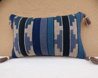 Distinctive pillows finely hand-crafted in New Mexico from thoughtfully curated vintage Navajo rugs and traditional Spanish weavings.