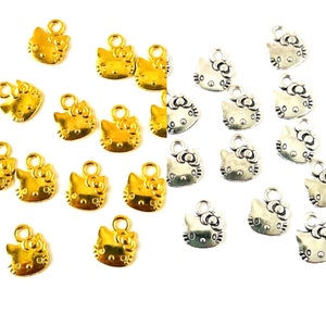 10 Kitty Charms In Gold And Silver Tone