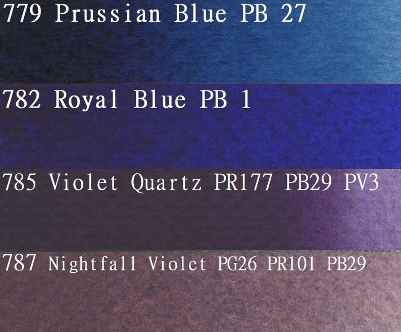 May include: Four paint swatches showing different shades of blue and purple. The swatches are labeled with numbers and paint pigment codes. The top swatch is labeled "779 Prussian Blue PB 27", the second swatch is labeled "782 Royal Blue PB 1", the third swatch is labeled "785 Violet Quartz PR177 PB29 PV3", and the bottom swatch is labeled "787 Nightfall Violet PG26 PR101 PB29".