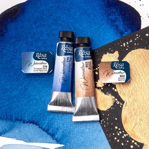 May include: Two tubes of Rosa Gallery watercolor paint, one Prussian Blue (779) and one Bronze (802).