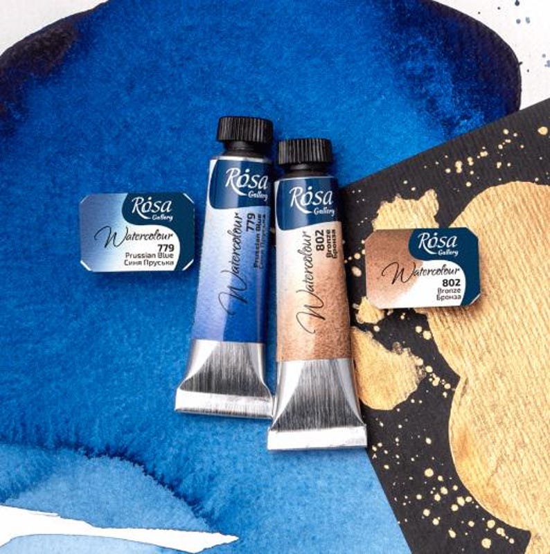 May include: Two tubes of Rosa Gallery watercolor paint, one Prussian Blue (779) and one Bronze (802).