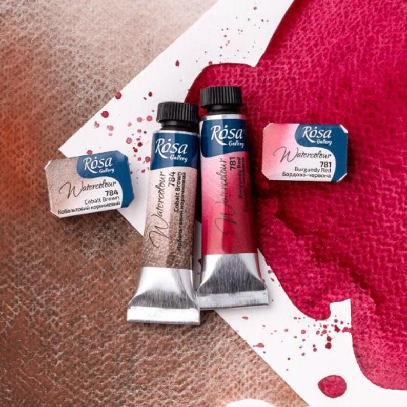 May include: Three tubes of Rosa Gallery watercolor paint. The tubes are labeled with the color name and number. The colors are Cobalt Brown (784), Burgundy Red (781), and Cobalt Brown (784).