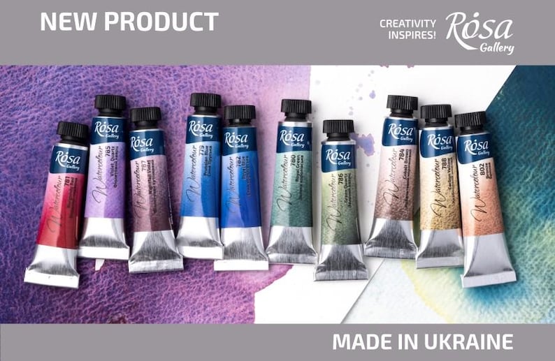 May include: A set of 10 watercolor paint tubes in various colors, including red, purple, blue, green, and brown. The tubes are labeled "R&oacute;sa Watercolor" and have a silver cap. The tubes are arranged in a row on a purple and blue textured surface. The text "CREATIVITY INSPIRES! R&oacute;sa Gallery" is visible in the upper right corner of the image. The text "MADE IN UKRAINE" is visible in the lower right corner of the image.