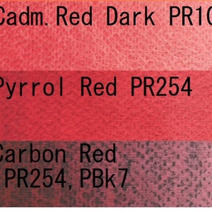 May include: Three paint swatches showing different shades of red. The top swatch is labeled "774 Cadm. Red Dark PR108", the middle swatch is labeled "775 Pyrrol Red PR254", and the bottom swatch is labeled "769 Carbon Red PB36, PR254, PBk7".