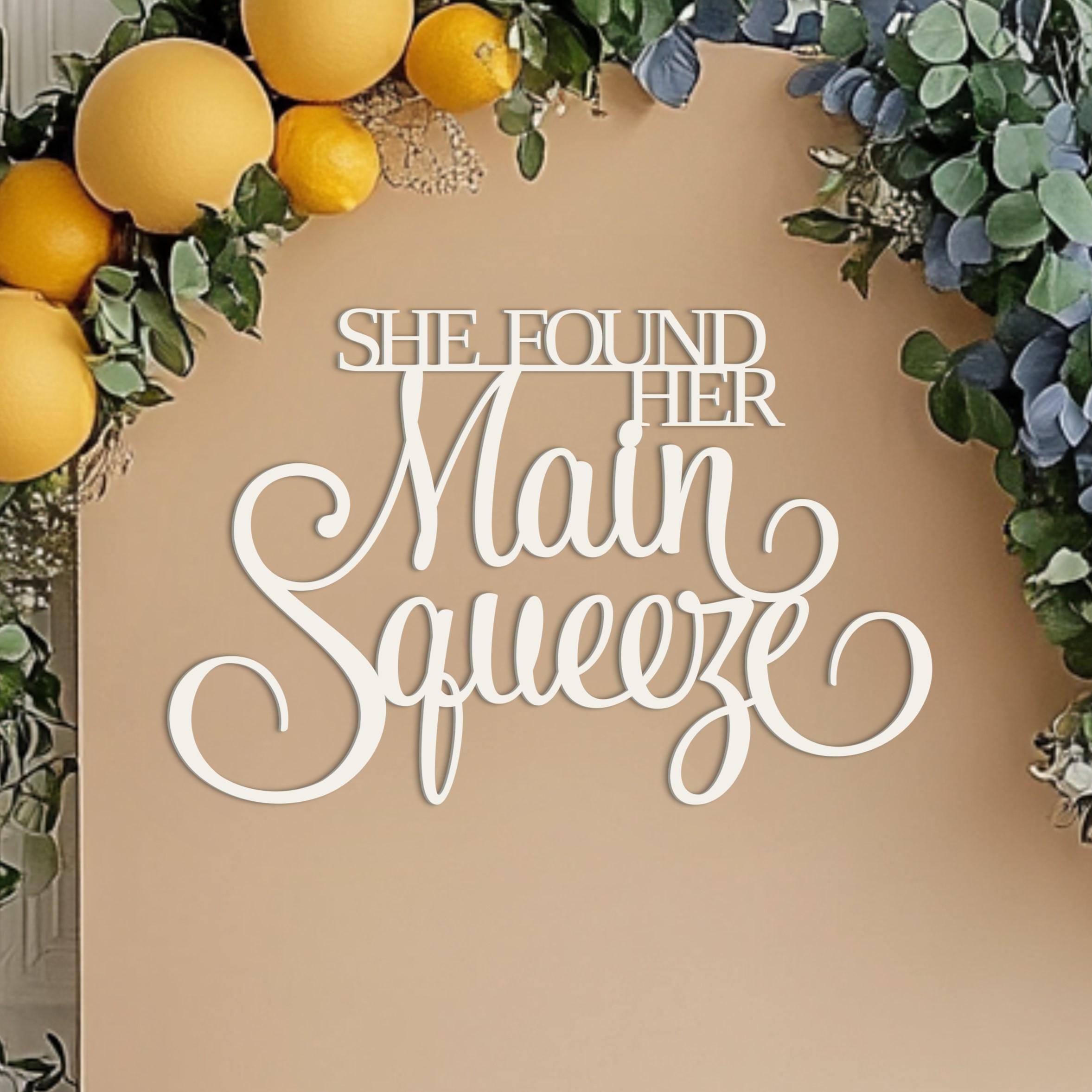 She found her Main Squeeze Sign for Bridal shower party backdrop wall decorations, 3D Wooden lemon themed photo booth centerpiece decor