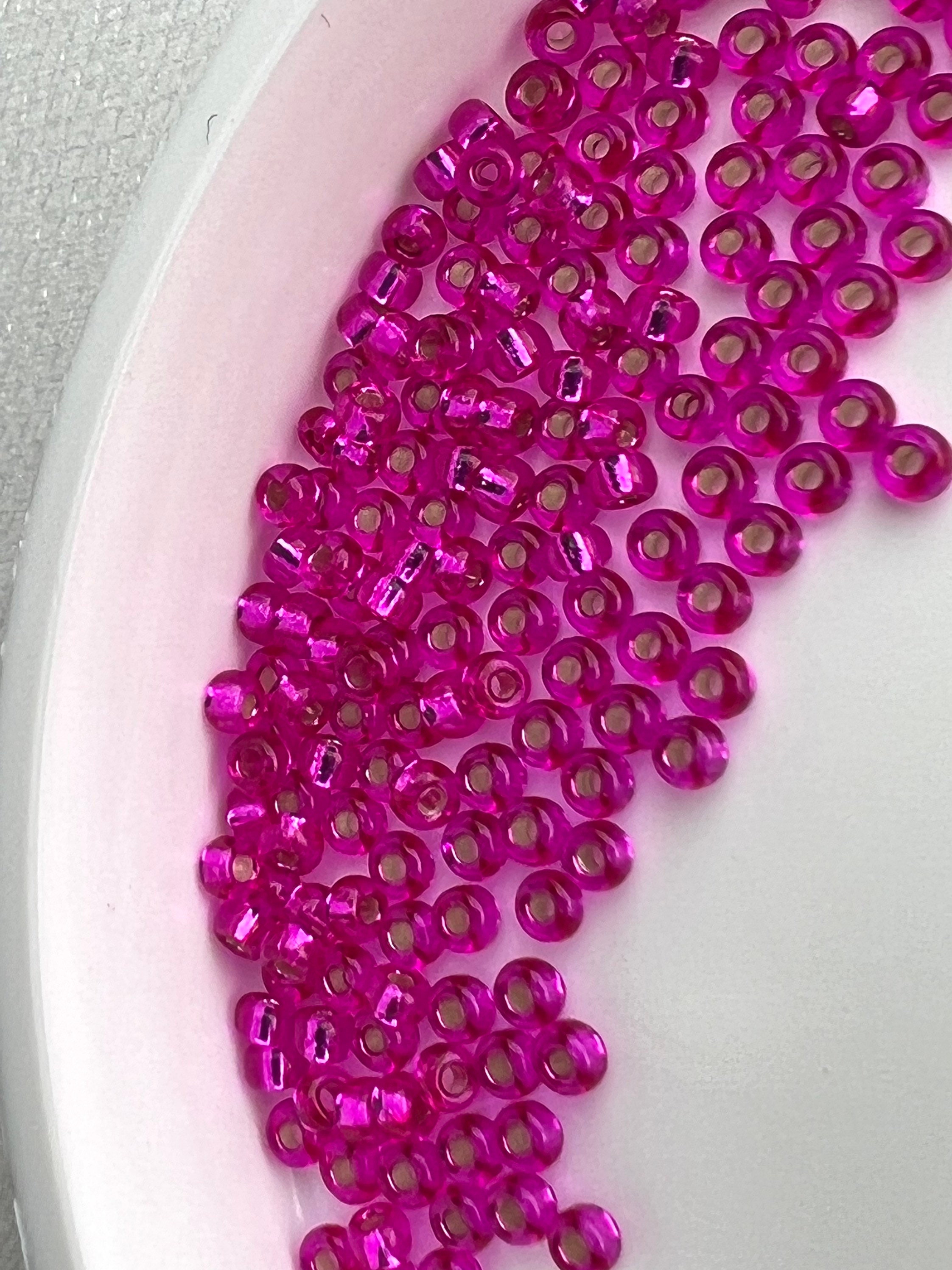 11-352, Miyuki 22g Fuchsia Lined Aqua 11-352, Miyuki 22g Fuchsia Lined Aqua