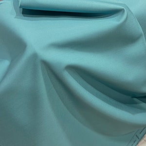Art Gallery Fabrics- AGF PE-442- “Ocean Waves” Solid Cotton Fabric