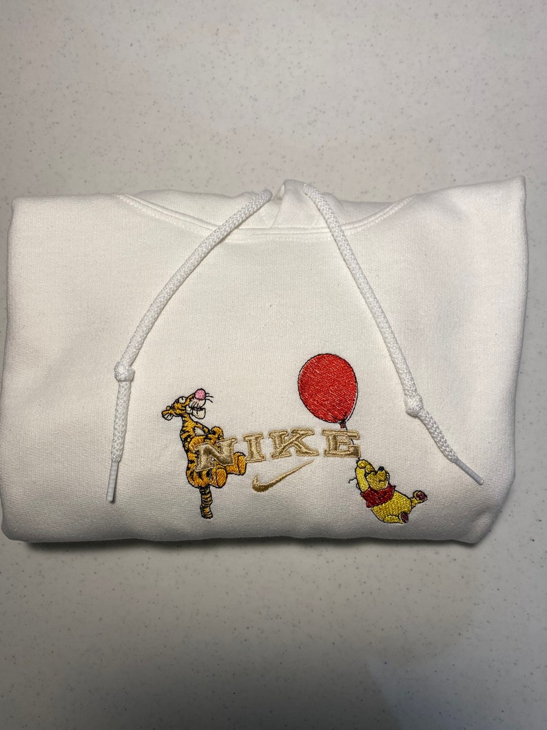 nike winnie the pooh crewneck