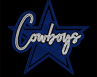 May include: A blue star with white rhinestones outlining a white cursive word "Cowboys" inside the star.