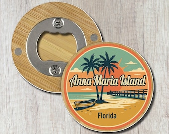 May include: A round wooden bottle opener featuring a circular graphic of a beach scene with palm trees, a boat, and a pier. The text reads Anna Maria Island and Florida. The metal opener mechanism is centered within the circular wooden frame.