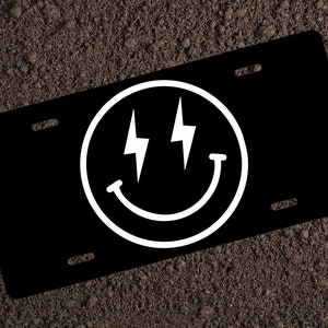 Smiley Face Lightning Shocking Black License Plate Car Accessories Great Gift