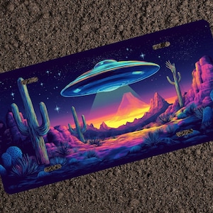 May include: A colorful illustration of a desert landscape with a flying saucer hovering over a mountain range. The scene is set against a starry night sky with a glowing sunset in the background. The desert is filled with cacti and other desert plants.