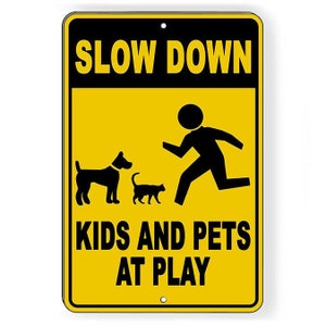 Slow Down Kids and Pets At Play Metal Sign WARNING children cats