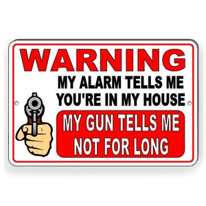 Mon alarme me dit que tu es dans ma maison, mon pistolet me dit pas pour long signe métallique
