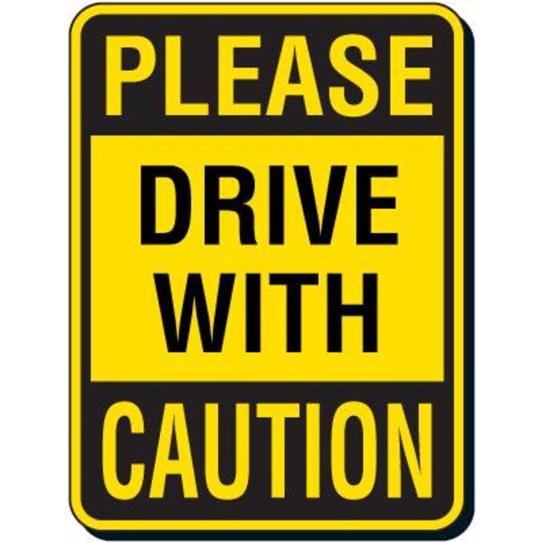 Drive With Caution Sign