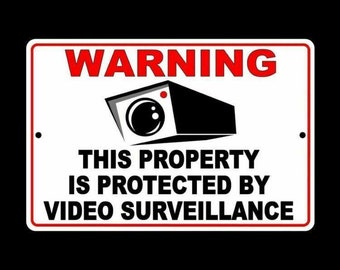 Avertissement Cette propriété est protégée par la sécurité des panneaux de vidéosurveillance