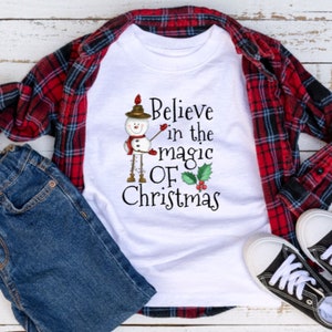 Believe In The Magic Of Christmas Shirt, Christmas Tshirt, Holiday Toddler Shirt, Cute Christmas Tshirt, Snowman Tshirt, Toddler Christmas
