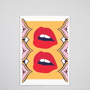 May include: A digital illustration of two pairs of red lips with white teeth on a yellow background. The lips are framed by a pink and blue patterned border.