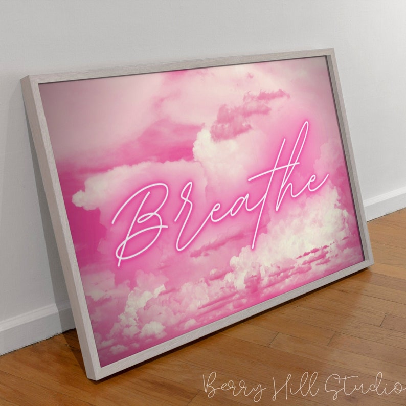 May include: A pink and white abstract cloud background with the word "Breathe" in pink neon lettering.