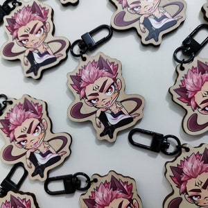 Chaveiros de anime com gatos e cachorros