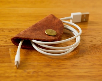 Leather Cord Taco | cord keeper technology accessories cable tie travel work style work from home organization tech gift recycled leather